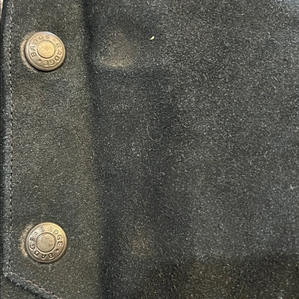 Vintage new men’s Badge blue leather suede vest with snap closure. Size large.